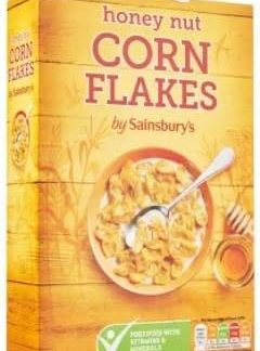 Хрустящие поджаренные кукурузные хлопья Sainsbury's Honey Nut Cornflakes 500 г — подслащенные хлопья с измельченным арахисом и медом.