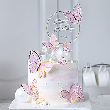 Набор из 30 украшений для кексов в виде бабочек розового цвета с золотой окантовкой, разных размеров, ярких цветов.