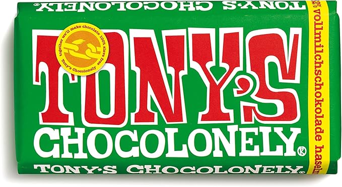 Шоколад TONY'S CHOCOLONELY с фундуком, молочный, 180 г. - шоколад, произведенный в соответствии с принципами справедливой торговли, с кусочками фундука. Не содержит пальмового масла, произведено в Бельгии.